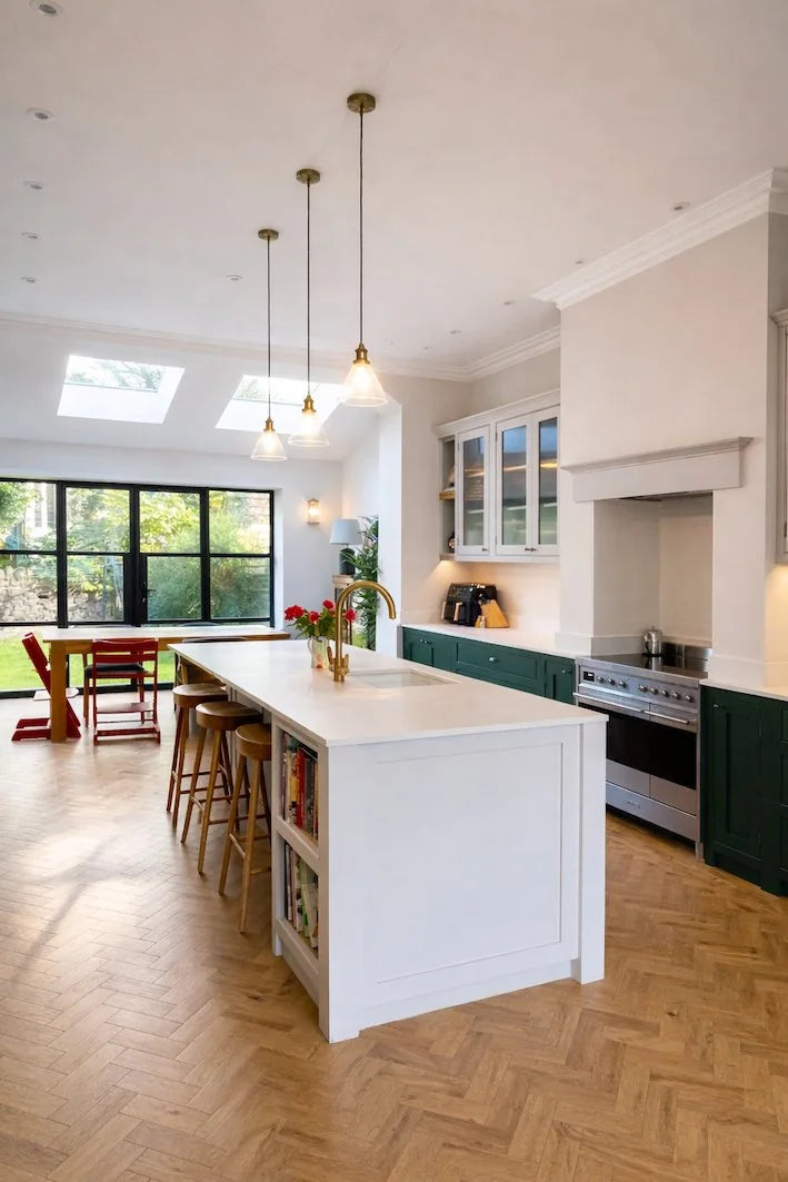 Cambridge HorizonLite rooflights bringing daylight into a kitchen with green cabinets