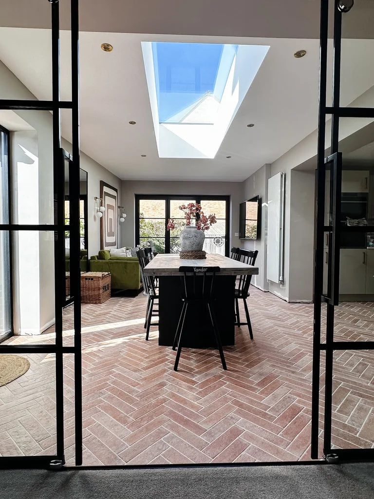 A clear view of the sky above the dining area in Rebecca James’s home